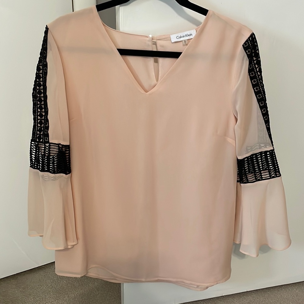 Calvin Klein Small silk blouse.  Peach color with black
